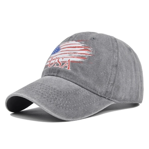 Detailed macro view of vintage washed grey cotton cap with red USA embroidery print