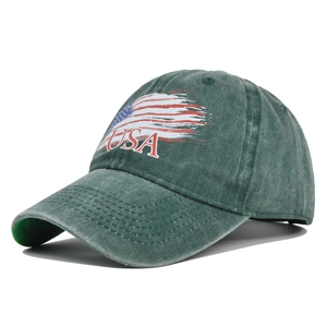 Close-up of vintage USA flag print and embroidery on distressed army green baseball cap