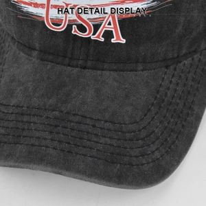 Detail of USA print on vintage washed black cotton baseball cap with stitch lines