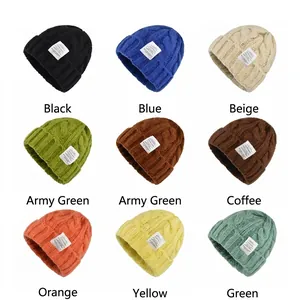 Multiple colorful cable knit beanies with patch design for autumn and winter warmth