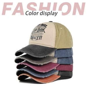 Detailed stack of distressed cotton baseball caps showing various vintage colors and frayed brims