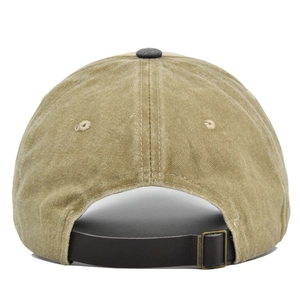 Detail view of khaki washed canvas baseball cap featuring black leather back strap and metal buckle