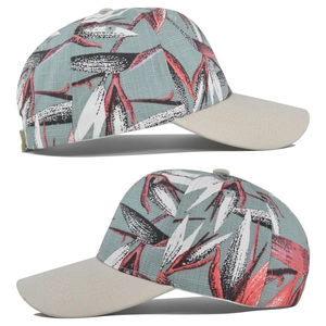 Detailopname van tropische bladprint en stiksels op de beige canvas baseballpet