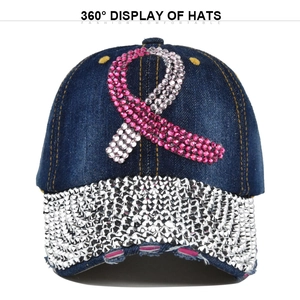 Detail of washed denim baseball cap with rhinestone ribbon and studded visor