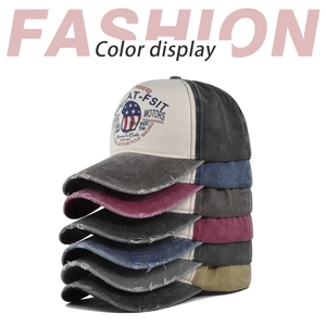 Close-up of distressed vintage baseball caps with MOTO graffiti print in various colors