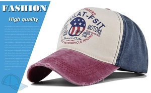 Close-up of vintage distressed baseball cap with MOTO graffiti print and tri-color panels