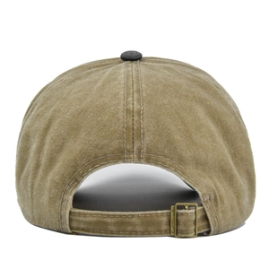 Detail view of khaki distressed baseball cap featuring adjustable strap and brass buckle
