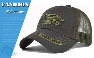 Close-up of Navy Seal embroidery on camouflage baseball cap with breathable mesh