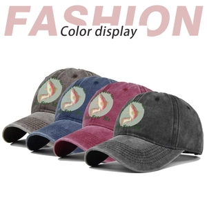 Multiple colors of washed cotton baseball caps with fish print and humorous text