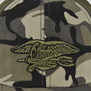 Detail of military camo baseball cap featuring a tactical eagle embroidery patch