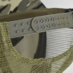 Detail of adjustable snapback closure on camouflage mesh trucker hat with breathable fabric