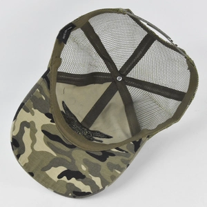 Detail view of the breathable camo mesh trucker hat with 100% cotton label and embroidery