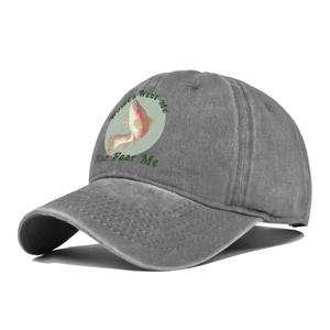 Macro view of distressed grey baseball cap with a colorful fish print and slogan