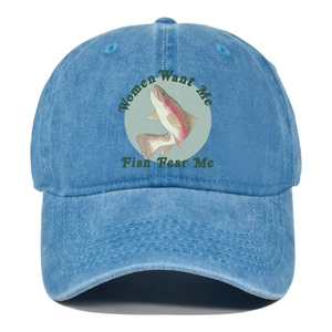 Detailed texture of light blue washed denim baseball cap with fish graphic and text