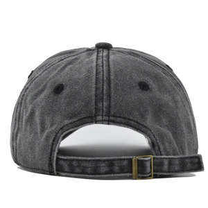 Detail of vintage washed grey baseball cap with adjustable metal buckle back strap