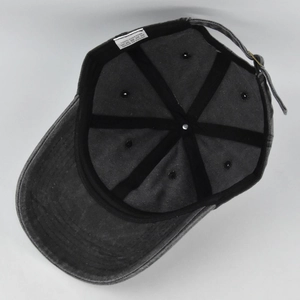 Detail of grey washed cotton baseball cap interior with sweatband and reinforced stitching