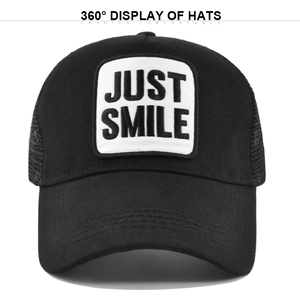 Breathable black trucker hat with JUST SMILE embroidery and mesh back for sun protection
