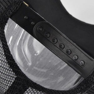 Close-up of adjustable snapback closure and breathable black mesh on the trucker hat