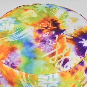 Close-up of vibrant tie-dye bucket hat fabric with graffiti patterns and heart details