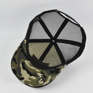 Detail of camouflage trucker hat showing 100% polyester label and mesh back construction