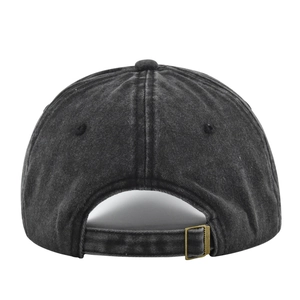 Detail view of washed vintage baseball cap featuring adjustable strap and antique bronze buckle