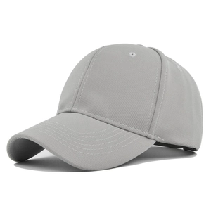Detailed side view of a structured light grey baseball cap with clean stitching and curved brim