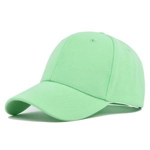 Detailed close-up of mint green cotton baseball cap with ventilation eyelets and stitching