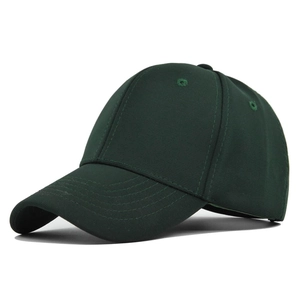 Close-up of forest green baseball cap showing six-panel stitching and twill fabric texture