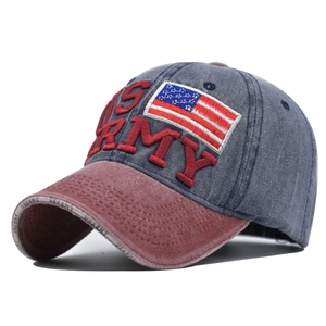 Detail of 3D US ARMY embroidery and flag patch on washed denim baseball cap