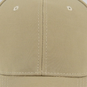 Close-up of khaki baseball cap stitching and side ventilation eyelets detail