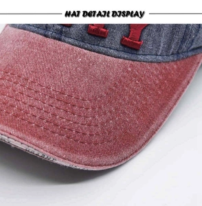 Close-up of 3D embroidery and durable stitching on a washed denim baseball cap