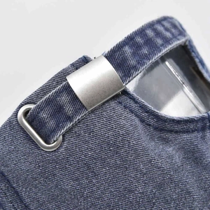 Rear view of washed denim baseball cap featuring metal buckle adjustment and 3D embroidery