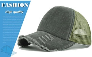 Detail of grey washed cotton baseball cap with green mesh and distressed brim design