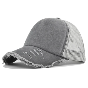 Detail of distressed brim on dark grey trucker hat with breathable mesh backing