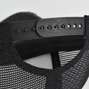 Adjustable black mesh trucker hat with breathable fabric and snapback closure detail