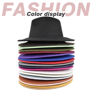Vertical stack of wide brim fedora hats in various vibrant felt colors for women