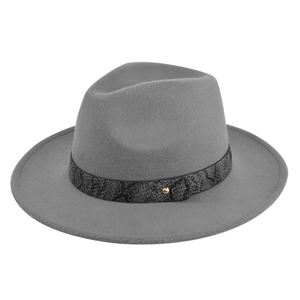 Detail of grey wool fedora hat featuring a snakeskin leather band and gold metal rivet