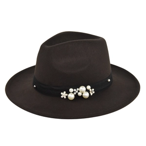 Close-up of dark brown wool fedora hat with pearls and floral metal accents on band