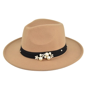 Detail of khaki wool fedora hat with black band featuring pearls and floral accents