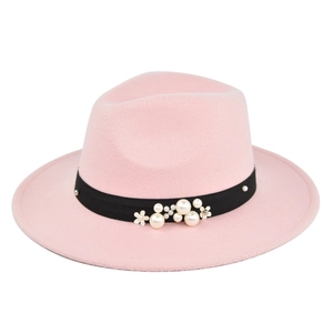 Pink wide brim felt fedora hat with black ribbon, white pearls and floral decoration