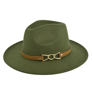 Detail of olive green fedora hat featuring brown faux leather band and gold chain buckle