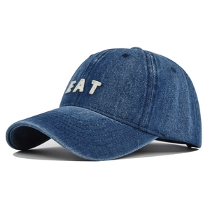 Vintage washed dark blue denim baseball cap with white EAT 3D embroidery detail