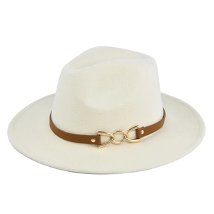 Detail of off-white wool fedora hat featuring a brown leather band and gold metal chain