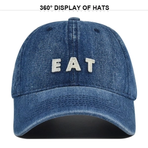 Retro washed navy denim baseball cap with white embroidered EAT patch and curved brim