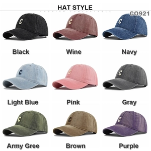 Detail showing nine colors of washed cotton baseball caps with embroidered C letter