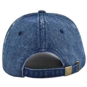 Detail view of washed blue denim baseball cap showing adjustable brass metal buckle closure