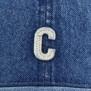 Vintage washed denim baseball cap featuring white letter C embroidery and curved brim