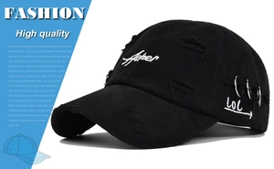 Distressed black baseball cap with Asher embroidery and metal ring side details