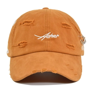 Detailed view of Asher embroidery on vintage washed distressed baseball cap with metal rings