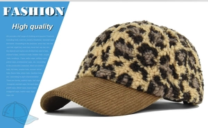 Close-up of leopard print faux shearling fabric and brown corduroy brim on baseball cap